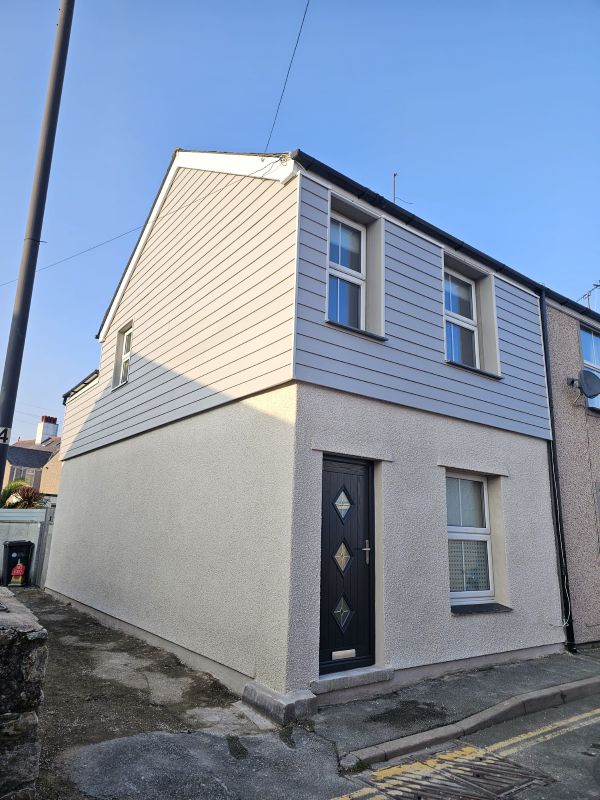 Second Cedral cladding and pebble dash house image by DM Design & Build LTD across Anglesey and Gwynedd areas