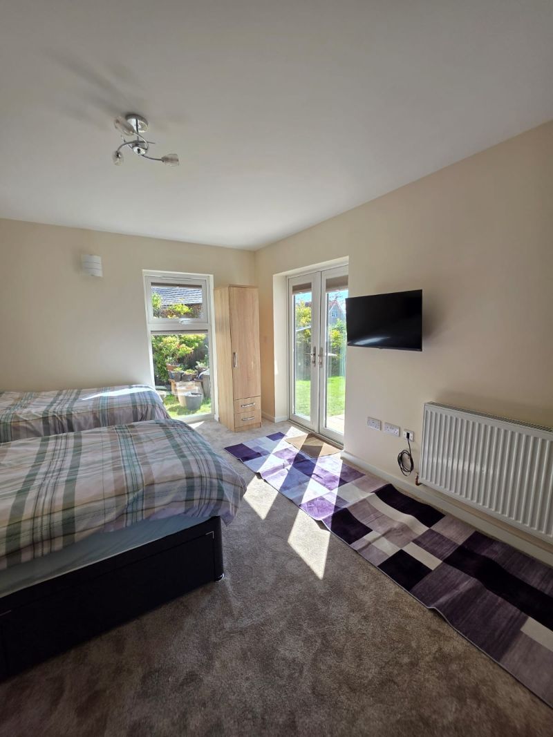 Bedroom created from garage conversion in Anglesey and Gwynedd