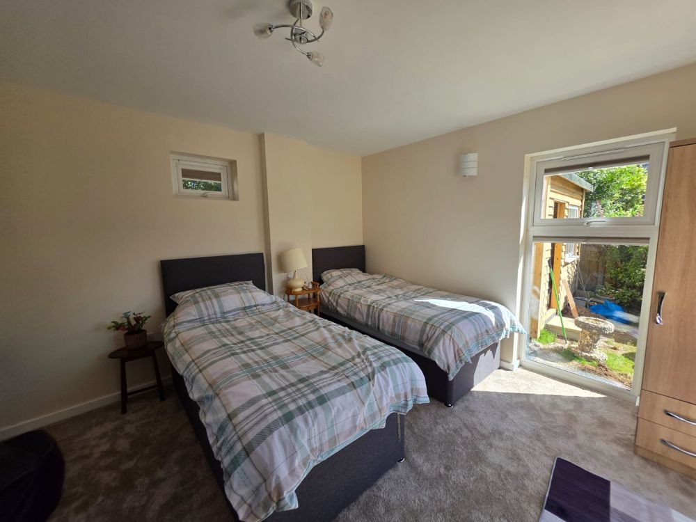 Finished bedroom created from garage conversion in Anglesey and Gwynedd
