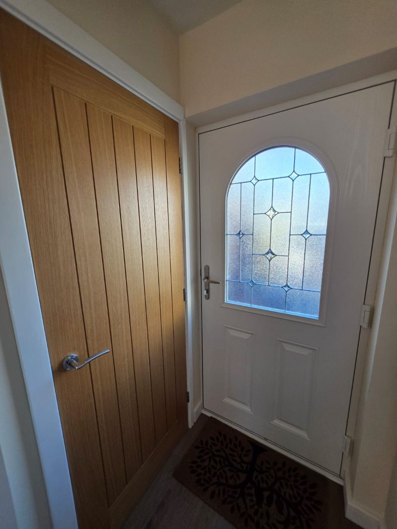 Internal door detail from garage conversion in Anglesey and Gwynedd